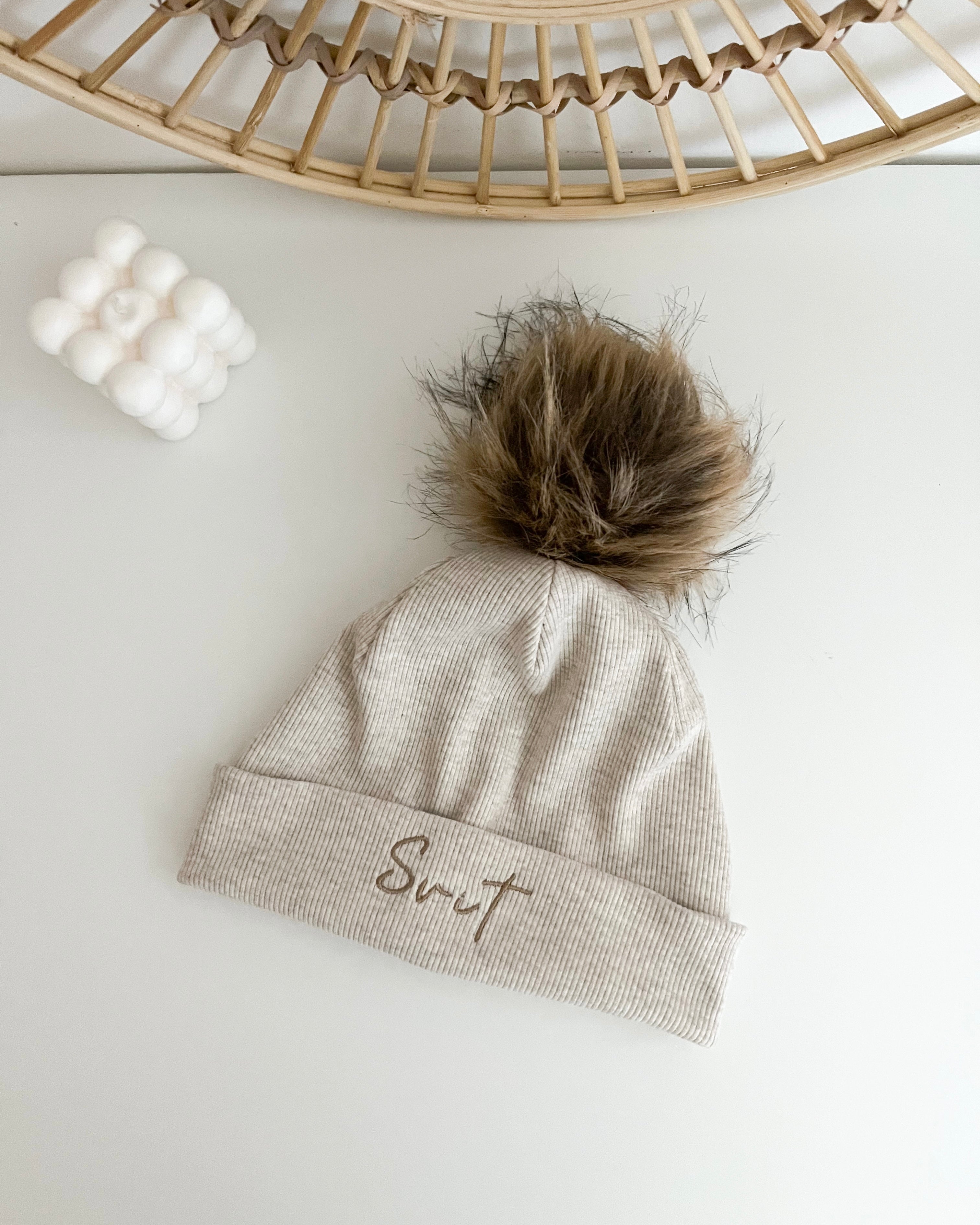 Otroška kapa s cofom - melange beige/navy