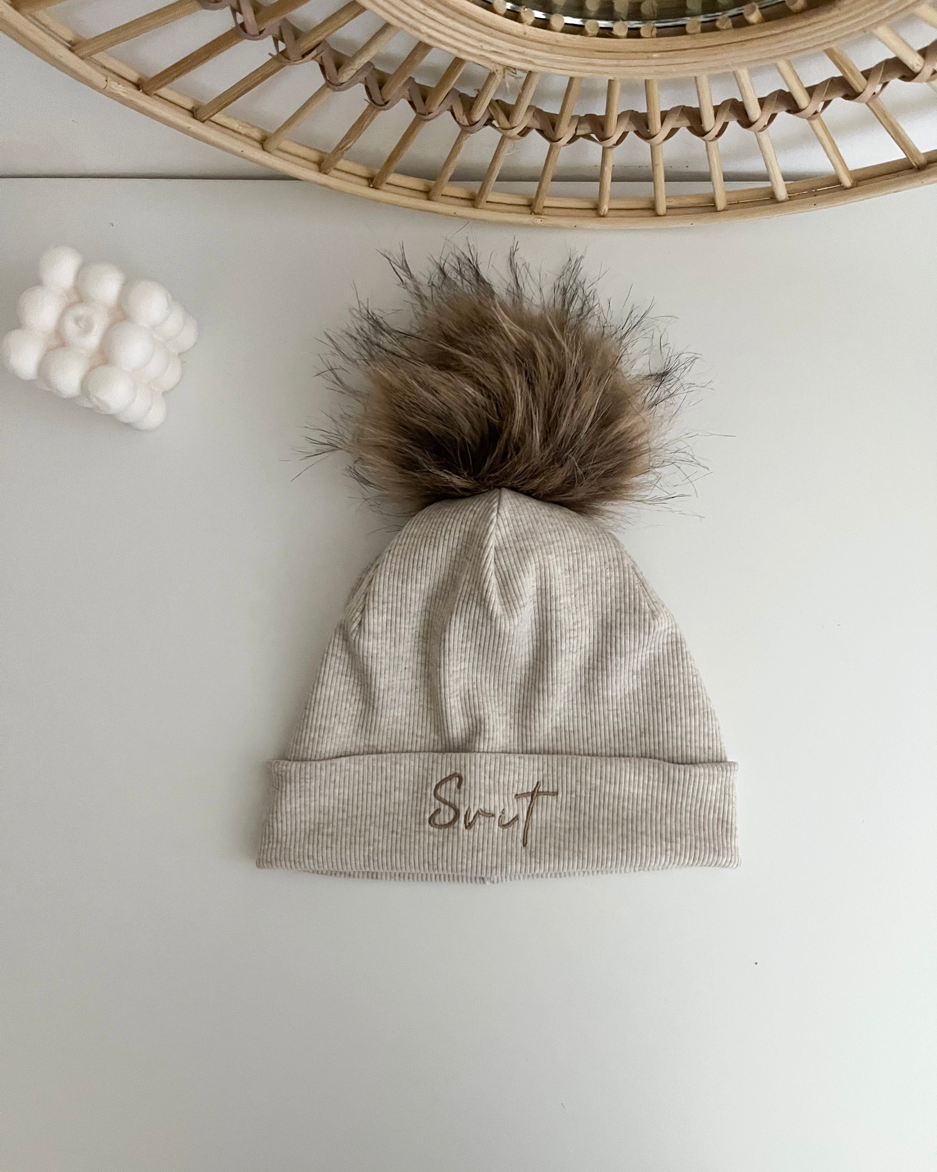 Otroška kapa s cofom - melange beige/navy